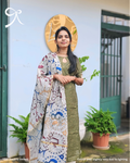Model wearing Olive Raw Silk Zari Checks Suit Set with Kalamkari dupatta, outdoor setting — Page maintained by Creations by Nash.