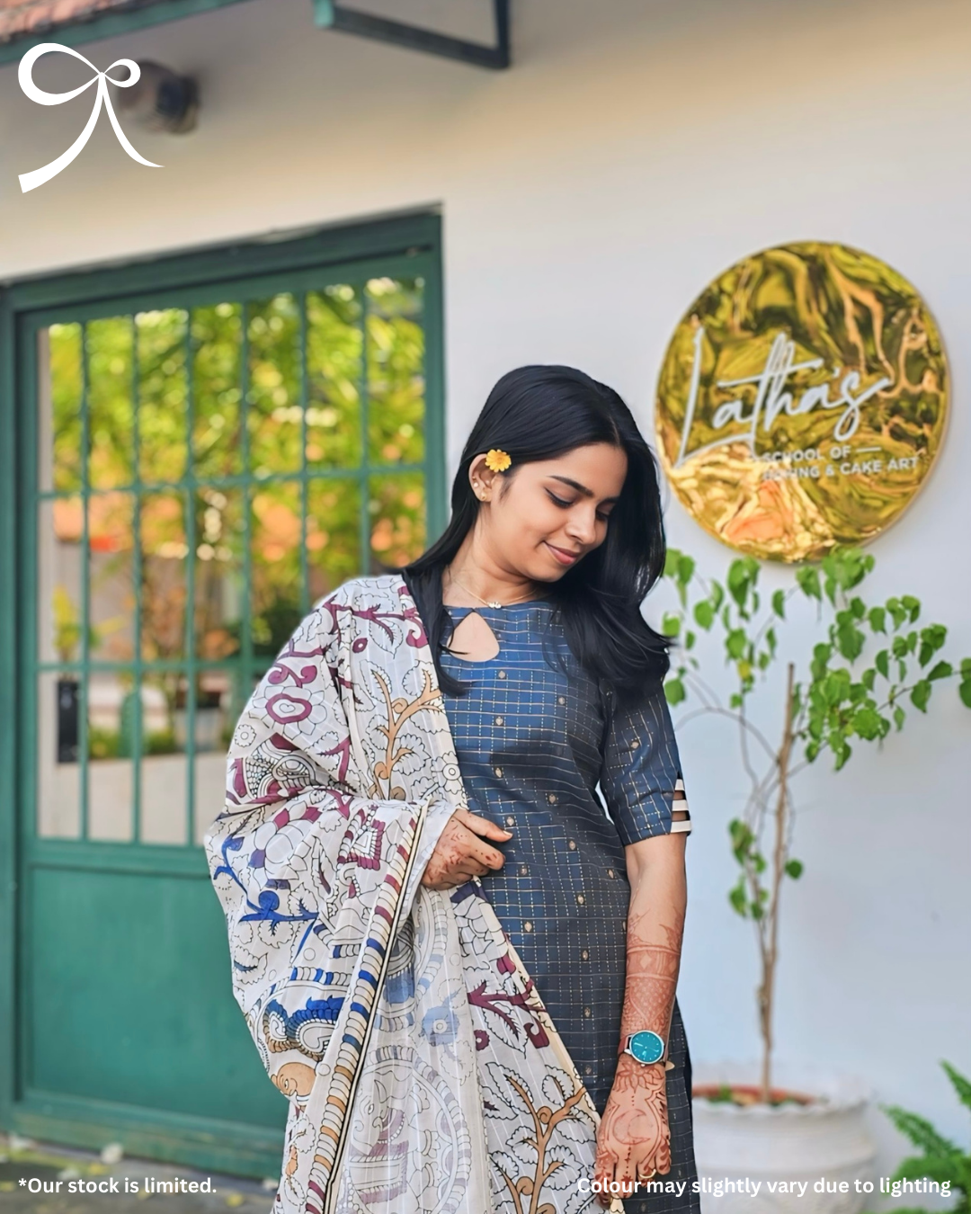 Model wearing Devrobes Raw Silk Zari Check Suit Set with Kalamkari Dupatta – Neelima, featuring navy blue zari checks and multicolor printed dupatta. Page maintained by Creations by Nash.