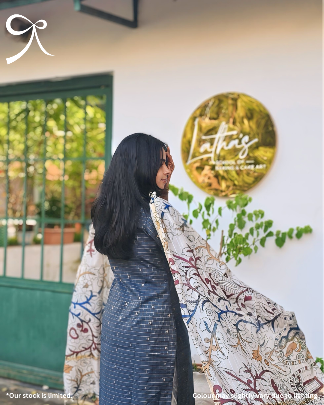 Model wearing Devrobes Raw Silk Zari Check Suit Set with Kalamkari Dupatta – Neelima, featuring navy blue zari checks and multicolor printed dupatta. Page maintained by Creations by Nash.