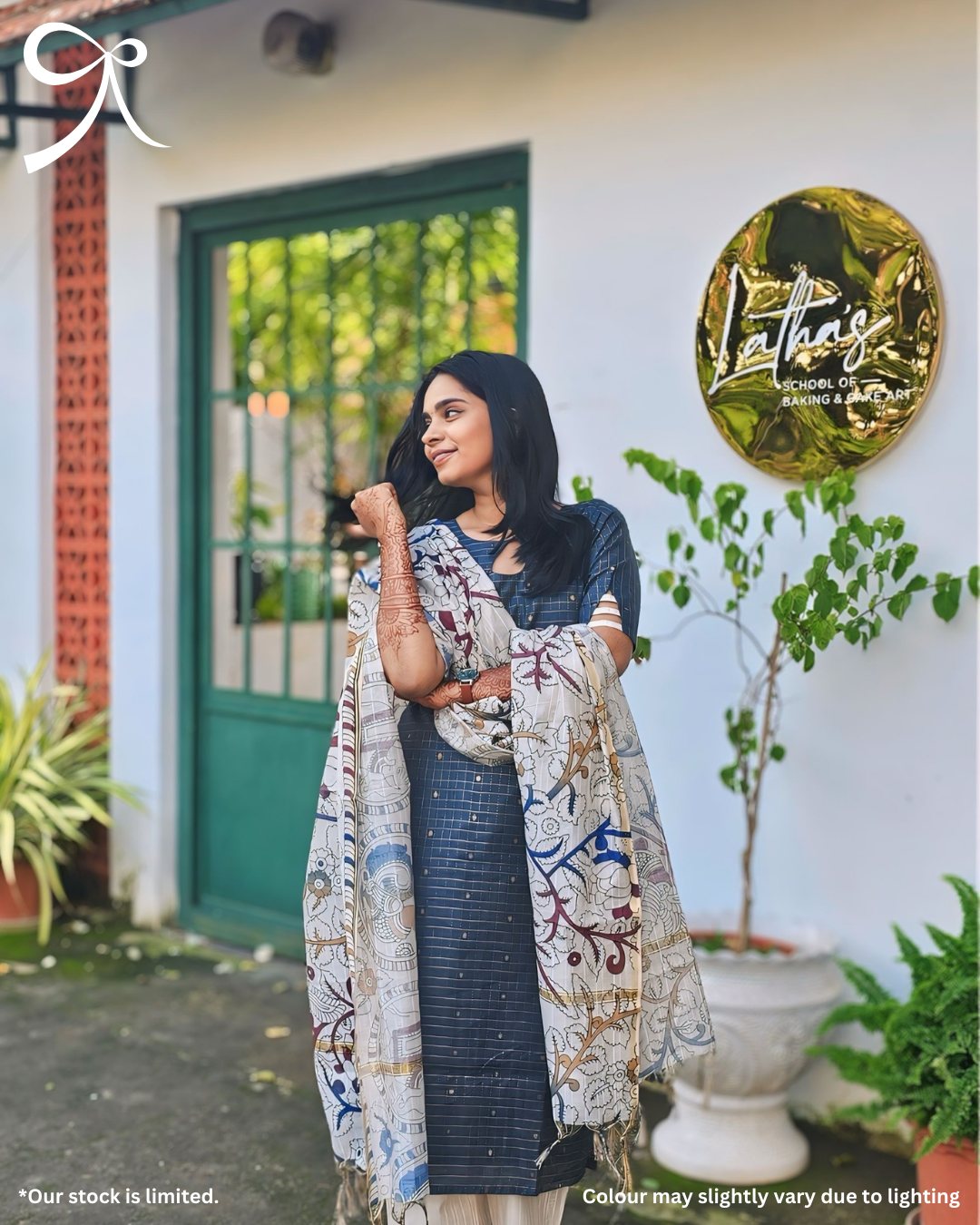Model wearing Devrobes Raw Silk Zari Check Suit Set with Kalamkari Dupatta – Neelima, featuring navy blue zari checks and multicolor printed dupatta. Page maintained by Creations by Nash.